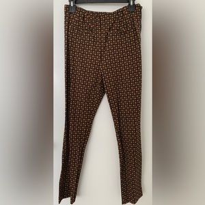 Anthropologie “the essential SLIM” stretch pants, brown circle print. Size 6.